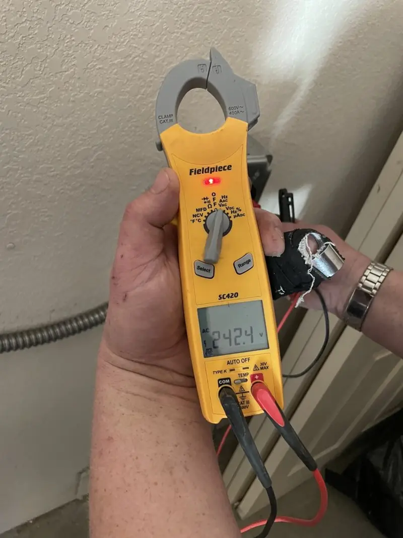 Voltage testing with clamp meter during Aluminum Wiring Replacement in Port Chester